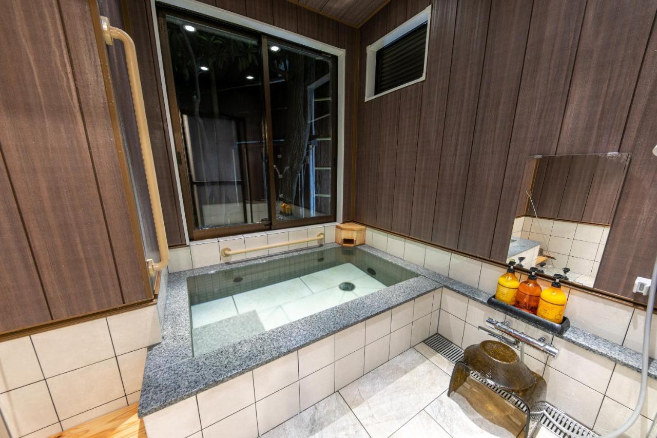 Готель Atami Onsen Yamaki Ryokan Екстер'єр фото