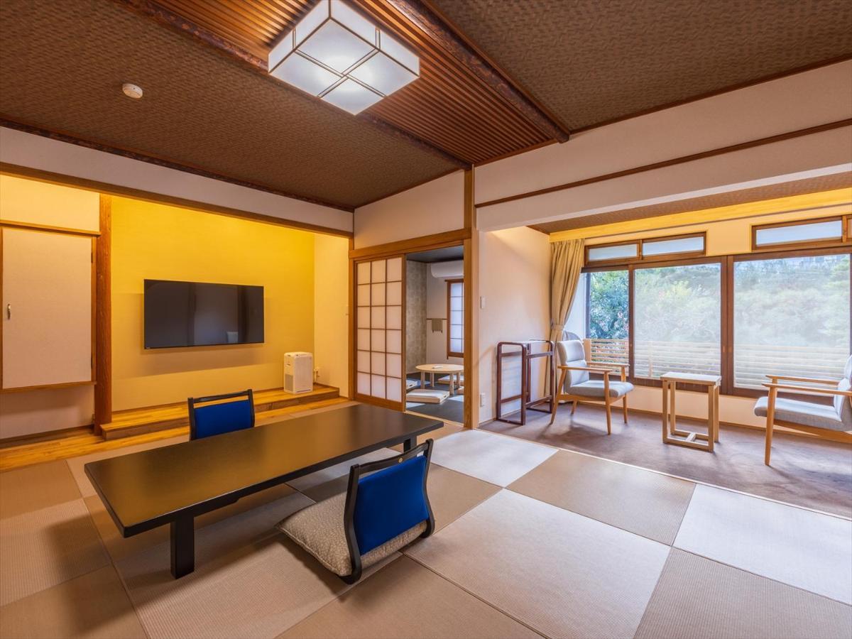 Готель Atami Onsen Yamaki Ryokan Екстер'єр фото